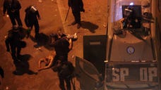 Egypt's Interior Ministry vowed Saturday to investigate the beating of a naked protester by riot police as they tried to bundle him into a police van after the incident was caught on camera and broadcast live on television.